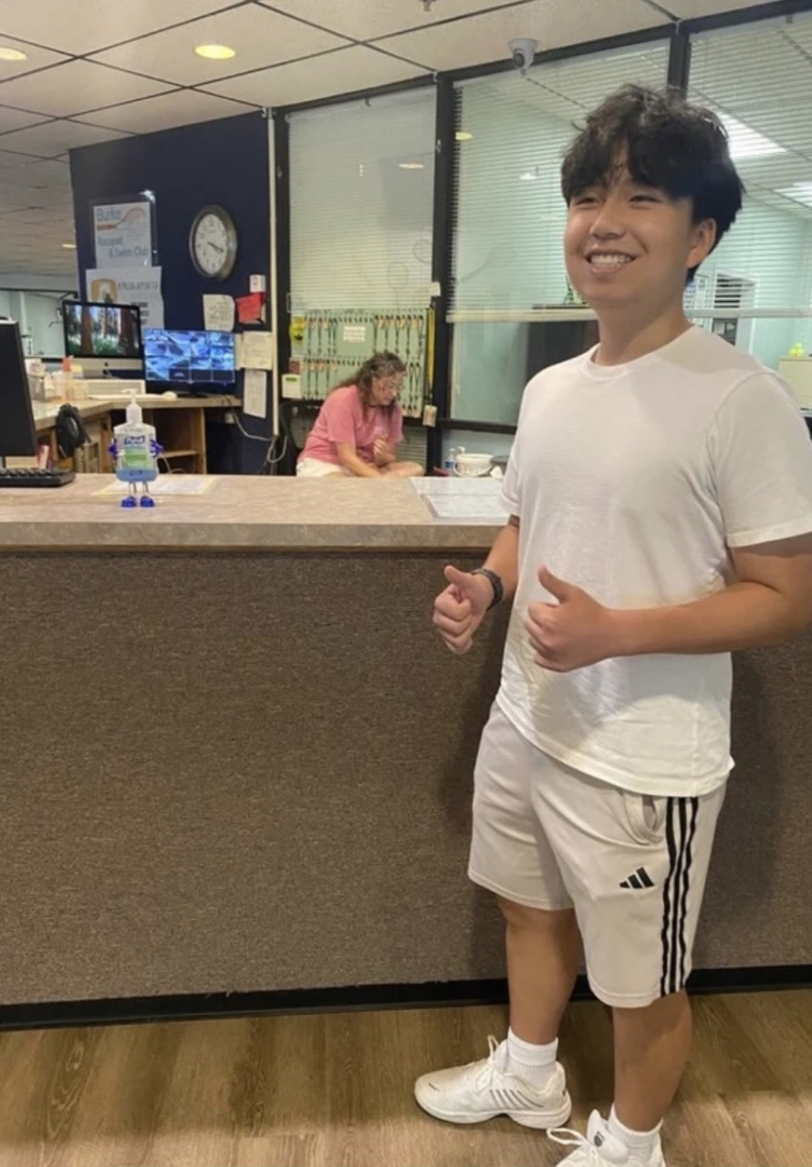 Brendan Li volunteering at Burke Racquet and Swim Club