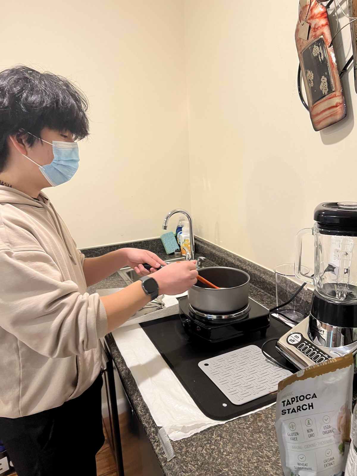 Brendan preparing chitosan material at home